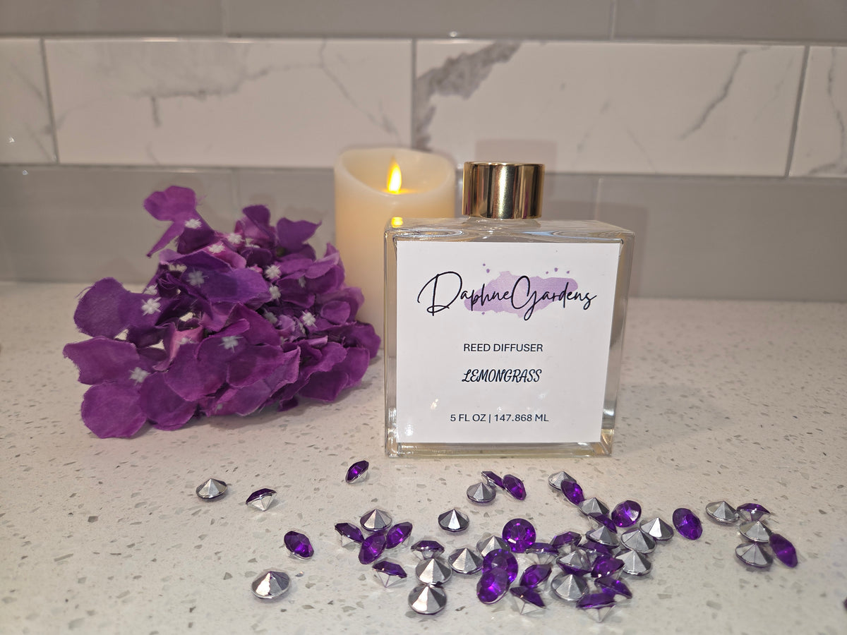 DaphneGardens 5 fl oz Lemongrass Reed Diffuser in a clear square bottle with a gold-colored cap.