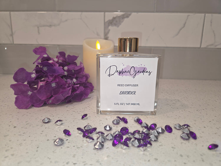 DaphneGardens 5 fl oz Lavender Reed Diffuser in a clear square bottle with a gold-colored cap.