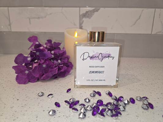 DaphneGardens 5 fl oz Lemongrass Reed Diffuser in a clear square bottle with a gold-colored cap.